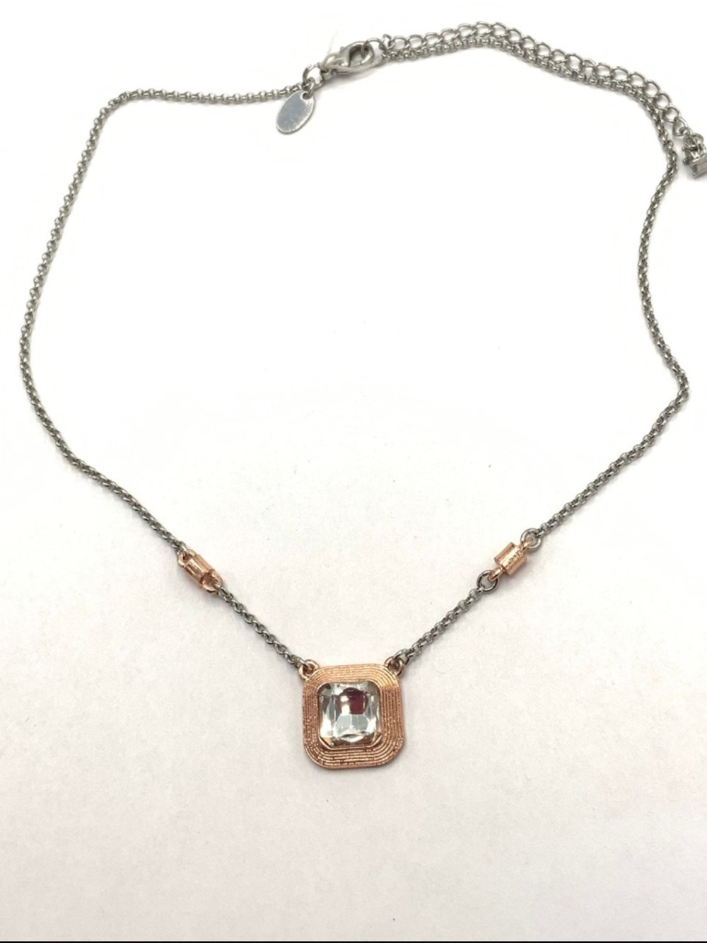 Lia Sophia silver tone necklace
Square pendant large clear crystal